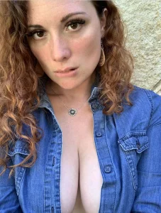 Texas OnlyFans model sexy photo - Texas Sunflower (@texassunflower10) wearing a denim jacket